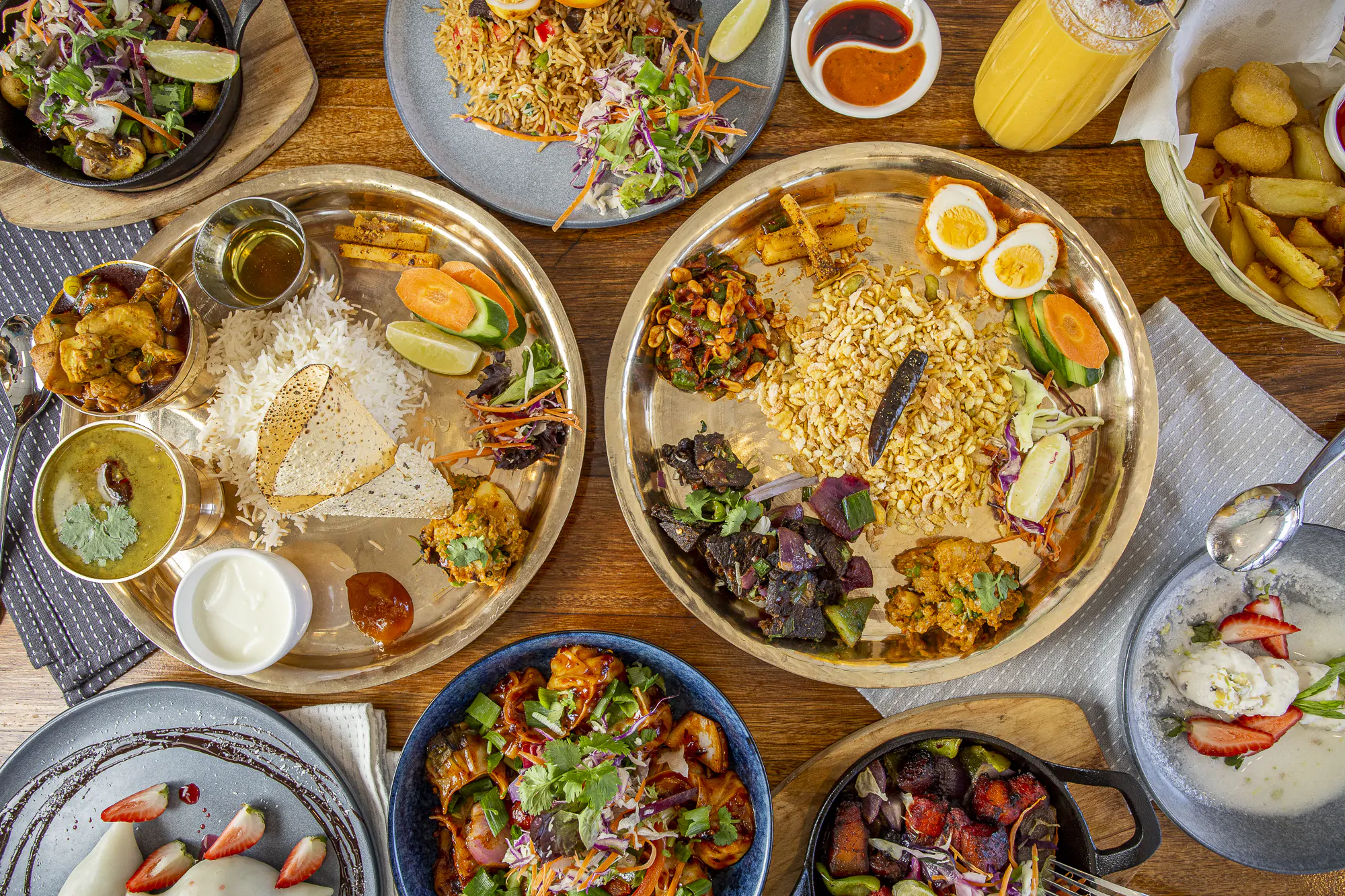Falcha Nepalese dishes served across a dining table